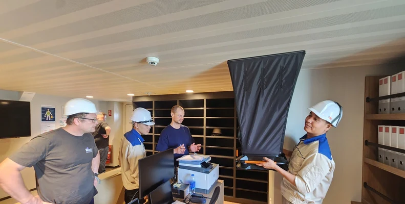 Tech Xanh engineers taking airflow measurements on site